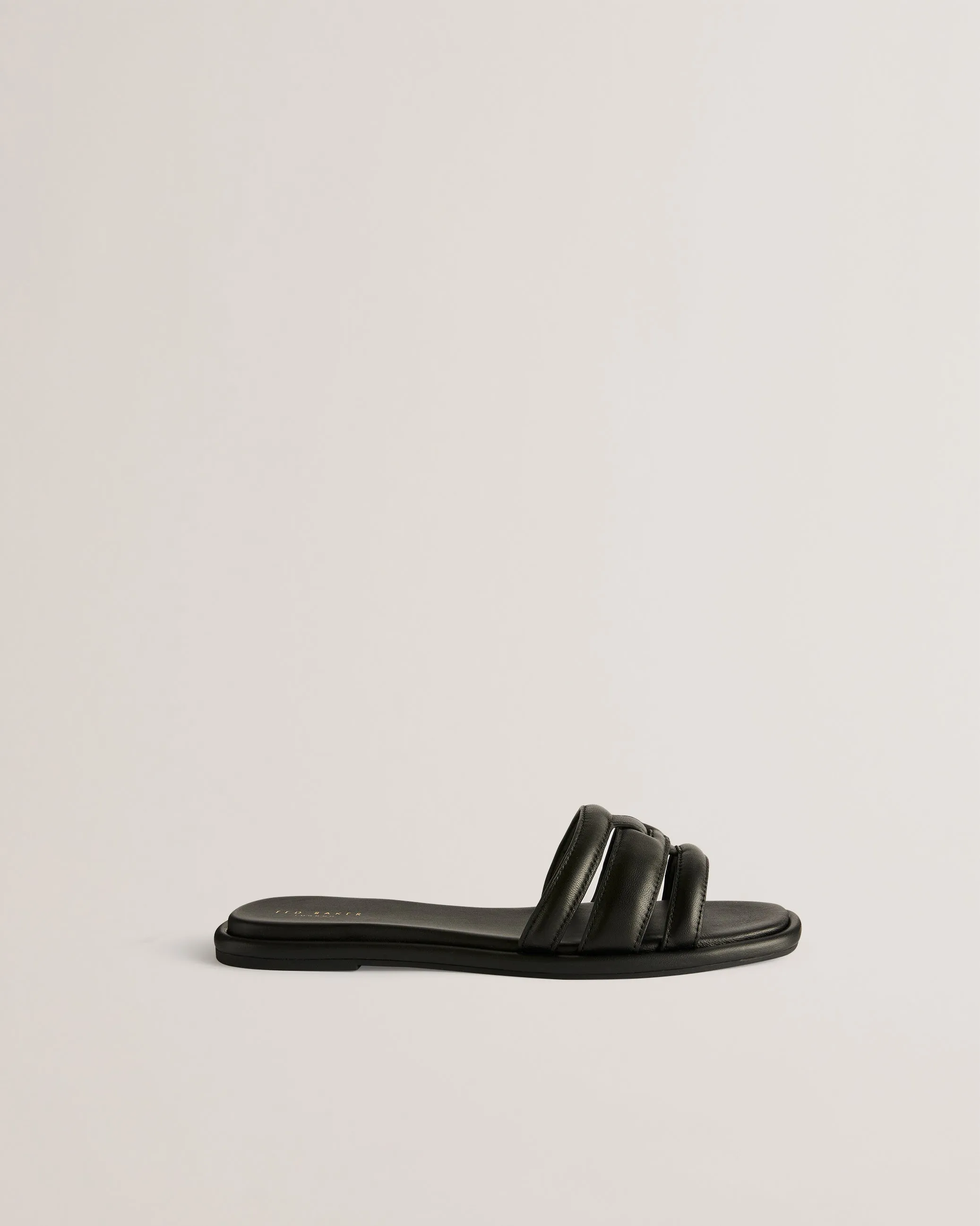 Leeiaa Flat Woven T Logo Slide Sandal Black